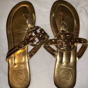 Gold metallic Tori Burch sandals